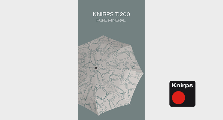 1 Knirps Regenschirm in weiß mit Muster.