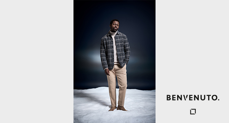 Mann mit kariertem Sakko Benvenuto