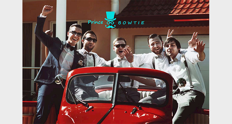 Männergruppe in weißen Hemden und Sakko von Prince Bowti