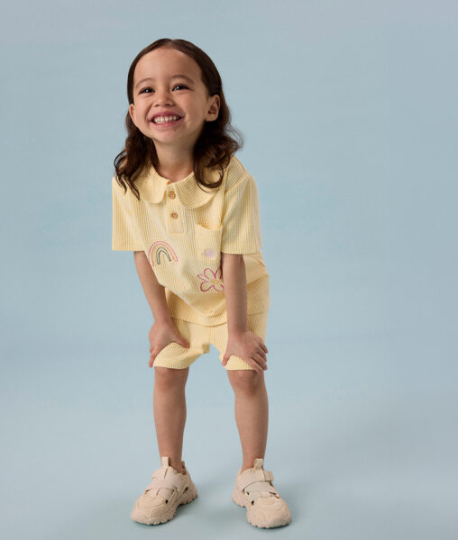 Reduziertes Mädchen Polo Shirt name it Gr. 92 – 128 und Mädchen Shorts name it Gr. 92 – 128 jeweils in gelb mit Muster